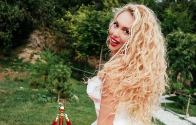 Оля Полякова