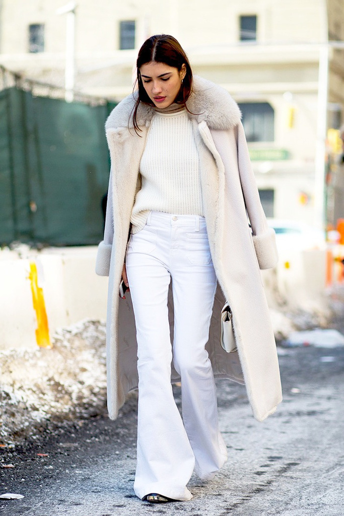 /storage/shares/uploads/files/Le-Fashion-Blog-Street-Style-Fashion-Week-Neutrals-Long-Shearling-Coat-Ribbed-Sweater-White-Flared-Jeans-Via-Harpers-Bazaar.jpg