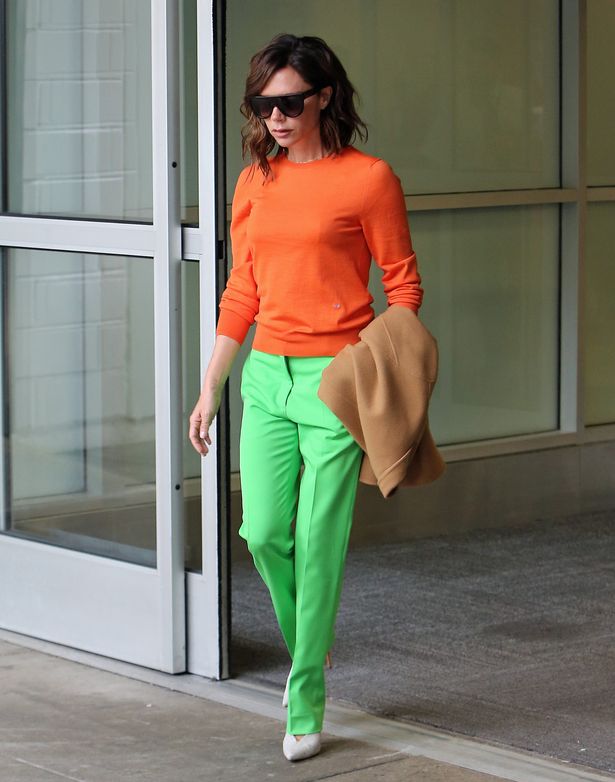 /storage/shares/uploads/files/Victoria-Beckham-touches-down-at-JFK-airport-in-New-York-wearing-bright-colors-after-arriving-from-L.jpg